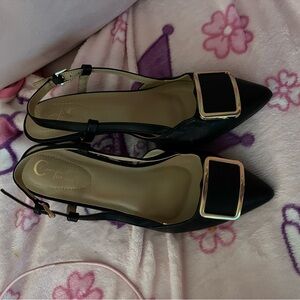 Black and gold kitten heel shoes